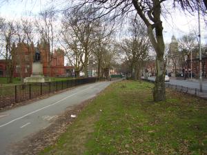 Oxford Rd path, cycleway and isolated grass strip outside new fence. Note that the Main Entrance has gone.